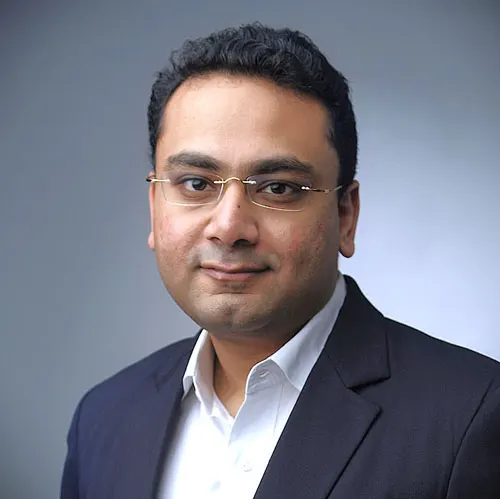 Mumbai's top implant dentist, Dr. Varun Malhotra, specializing in single and full-mouth dental restorations.